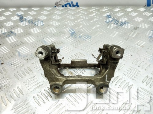 Скоба заднего суппорта левая для Вольксваген Passat B7 oe 5K0615425 запчасти бу Скоба заднего суппорта левая для Вольксваген Passat B7 oe 5K0615425 разборка бу